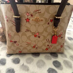 Coach tan crossbody purse